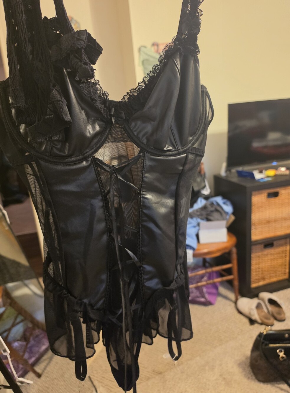 Black Leather & Lace Bustier with stockings and panties to match.